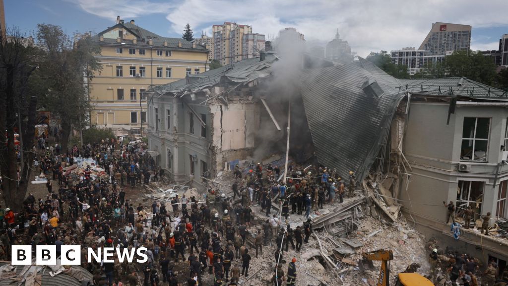 Watch: Staff help clear rubble from destroyed Kyiv hospital