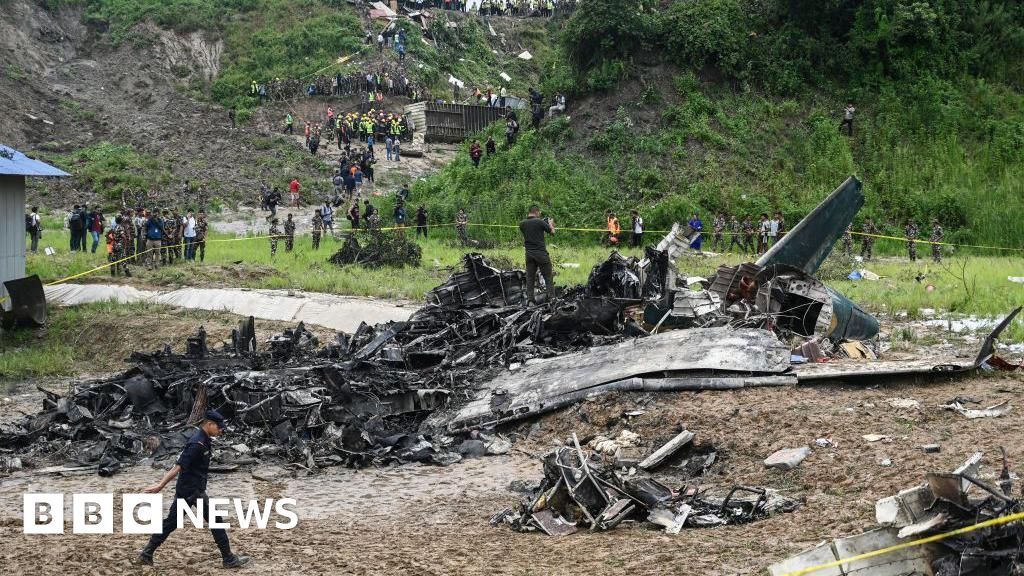 Nepal plane crash: Emergency workers pick through wreckage