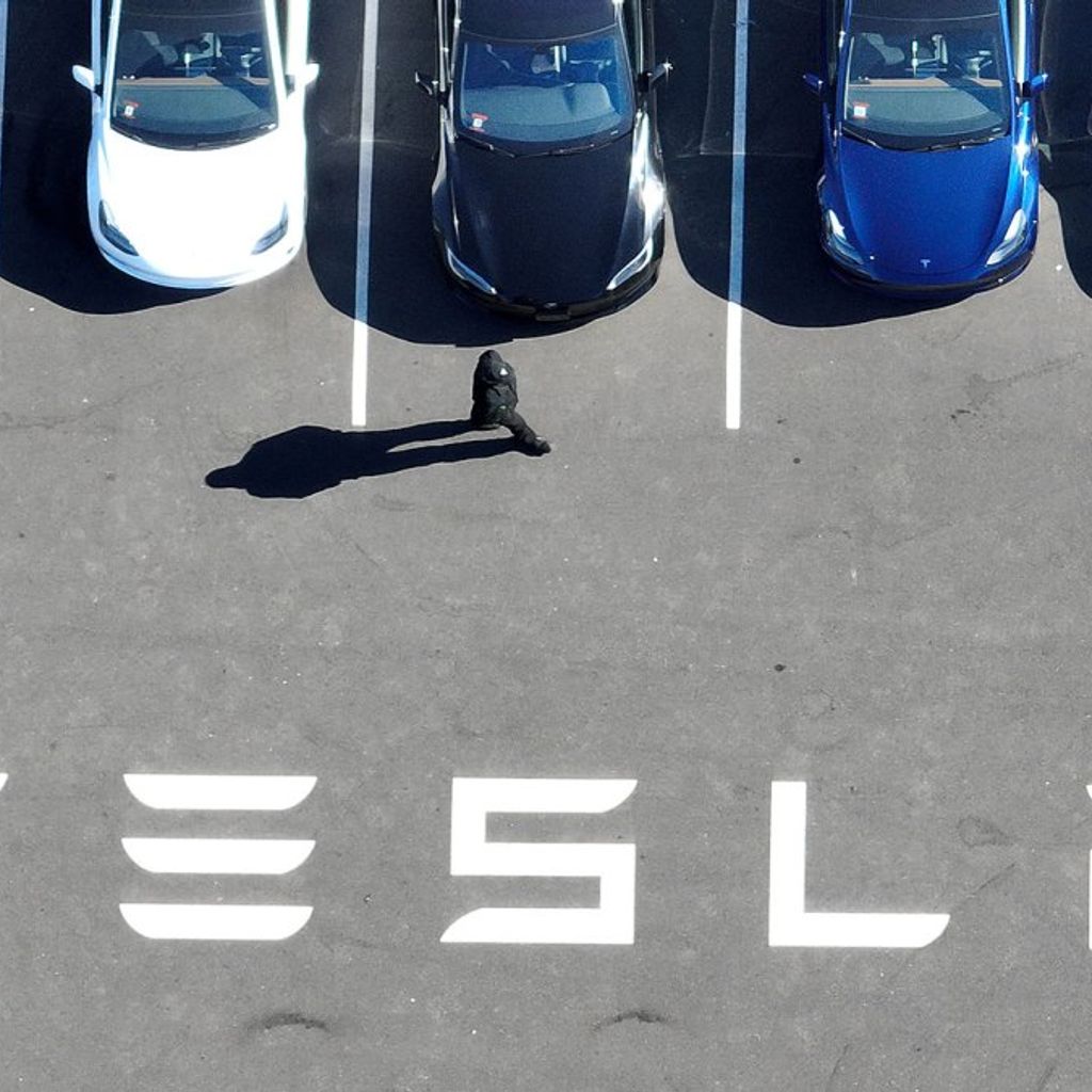 Tesla profits drop 55%, company says EV sales 'under pressure' from hybrids | TechCrunch